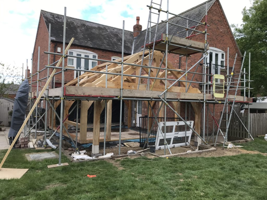 Timber frame extension being installed